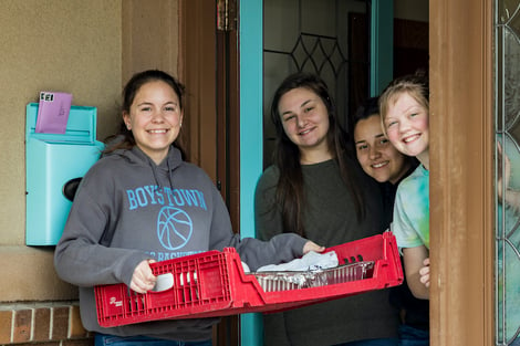 Girls receive lunch